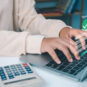 Accounts payable automation software for Singapore SMEs with digital payment processing on a laptop.
