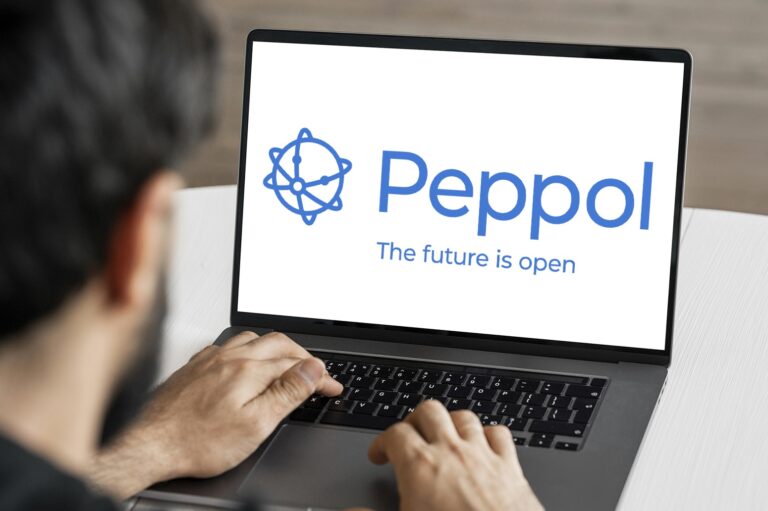 Peppol logo displayed on a laptop screen for Singapore e-invoicing and Peppol access point services.