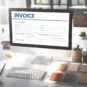 Online invoice processing software displayed on a desktop computer for automated invoice management.